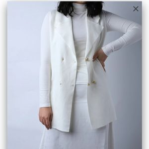 Black vest with four front buttons